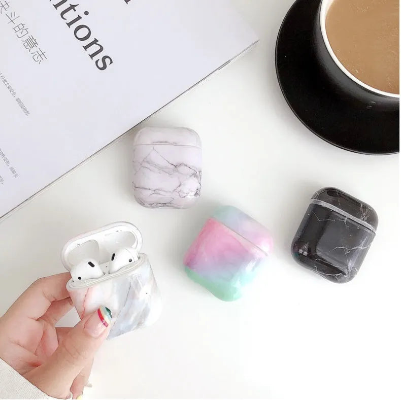 White marble patterned hard PC protective cover for AirPods 1 and AirPods 2 charging case.