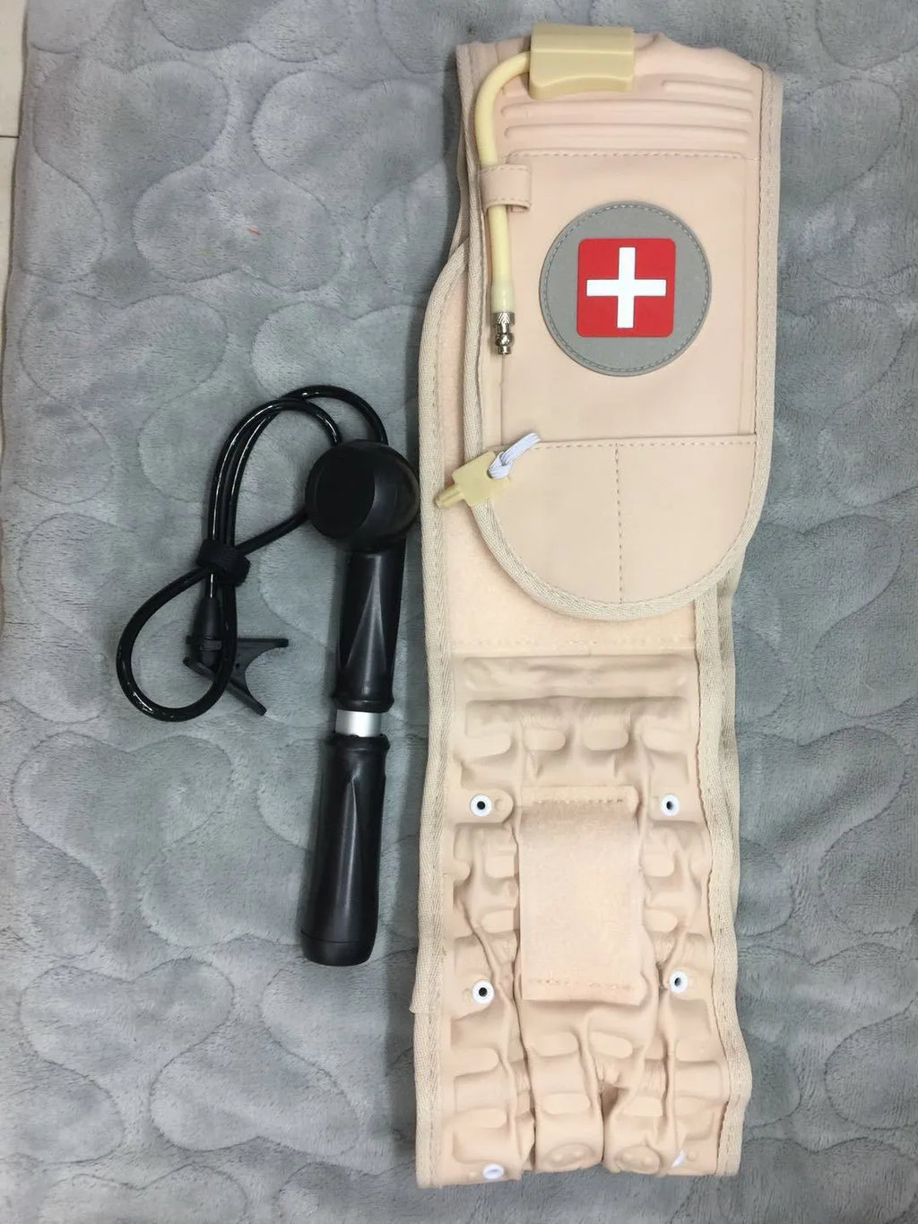 Waist air traction brace belt with inflatable ball and magnetic massage for lumbar spine support, worn on the waist