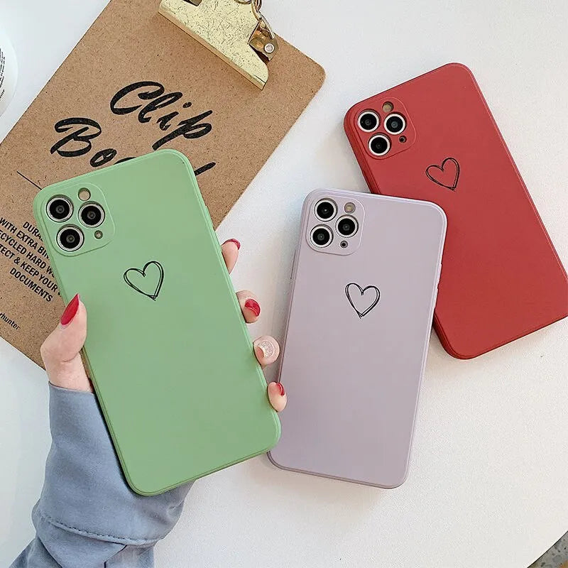 Solid colour silicone TPU phone case for Apple iPhone on a table