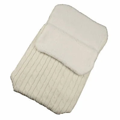 Envelope-style baby stroller sleeping bag in beige colour with thick filling, shown next to a pram.
