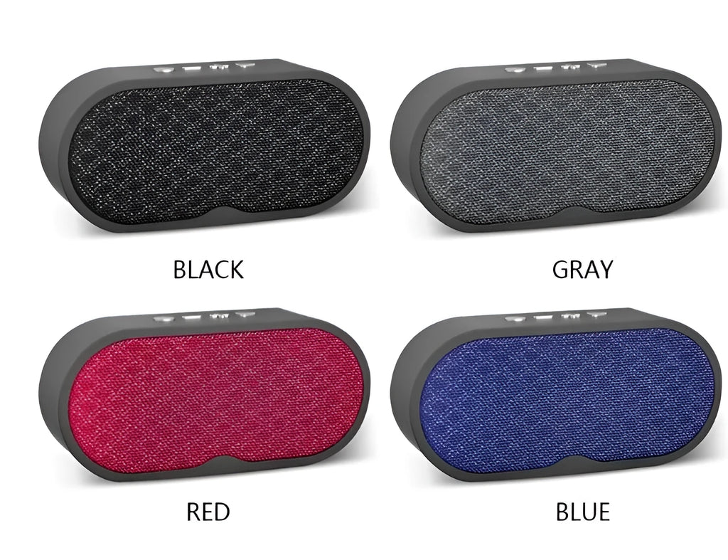 Grey portable Bluetooth subwoofer speaker with HD microphone, USB port, and TF card slot on a table.