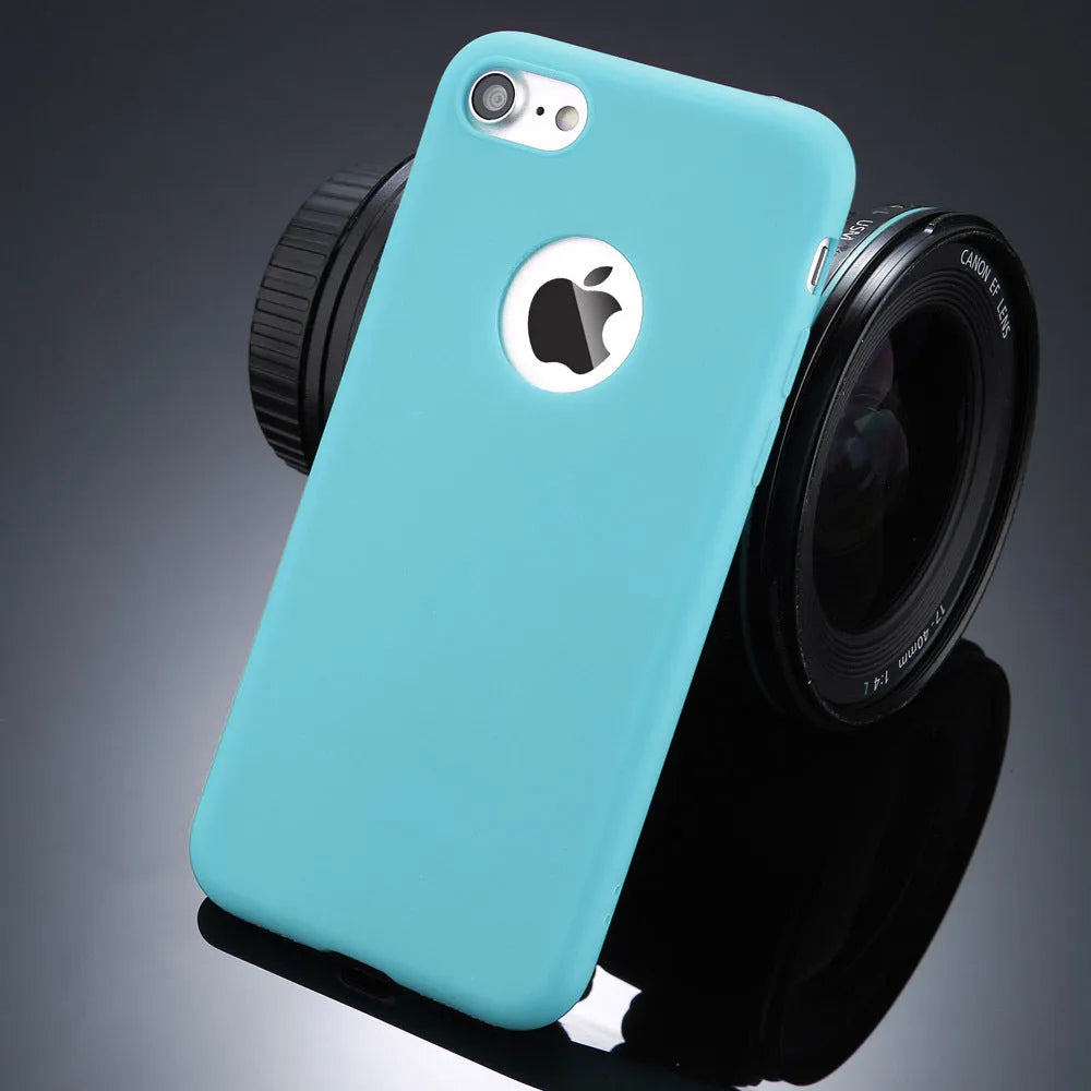 USLION soft silicon candy colour phone case for iPhone X XR 7 6 5 models on a table.