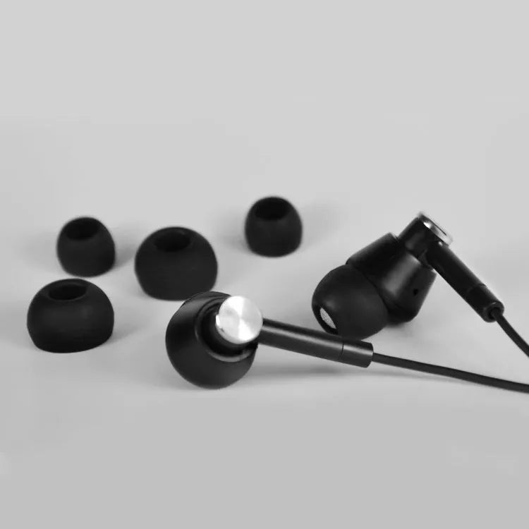 Black and white in-ear earphones with 3.5mm jack for computers and mobile phones