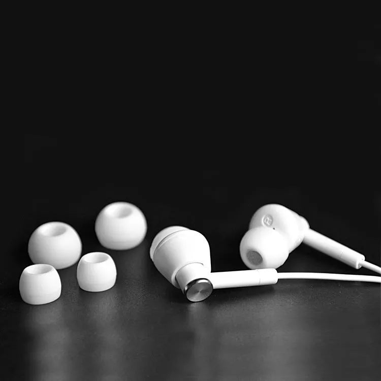 Black and white in-ear earphones with 3.5mm jack for computers and mobile phones