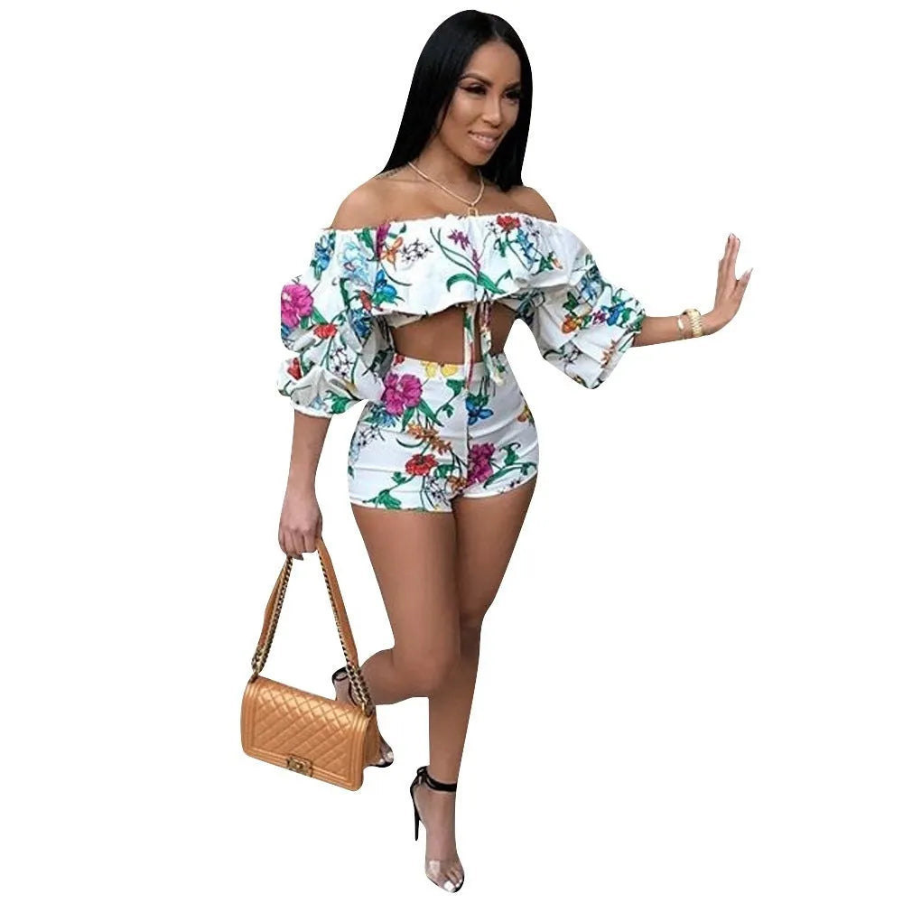 Multicolour digital print women's two-piece tracksuit with pile sleeves on the short top and matching shorts.
