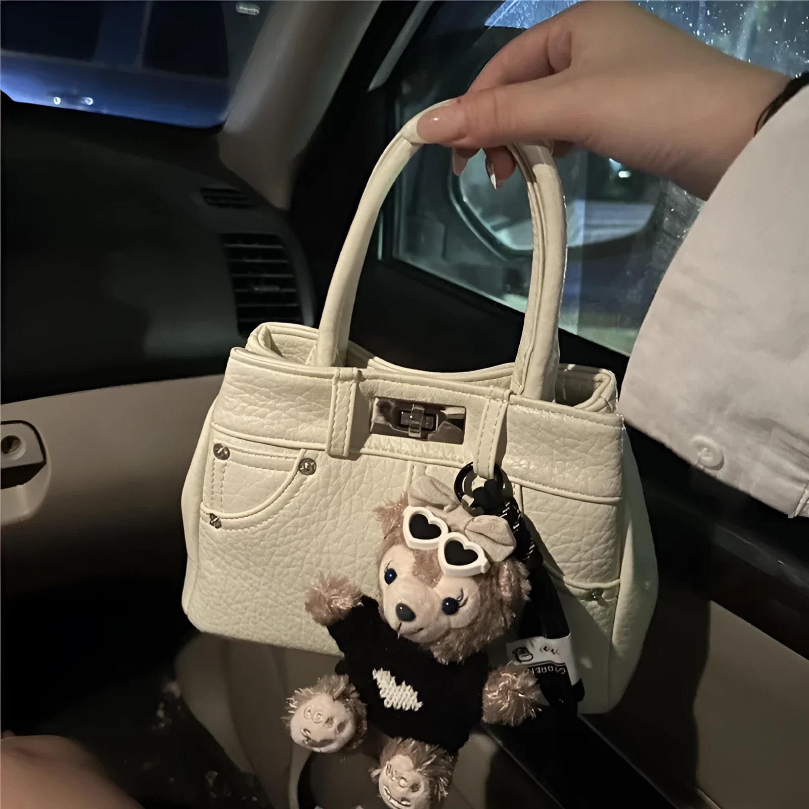 Women's soft PU commuter shoulder bag in denim blue or white with standard size and polyester lining