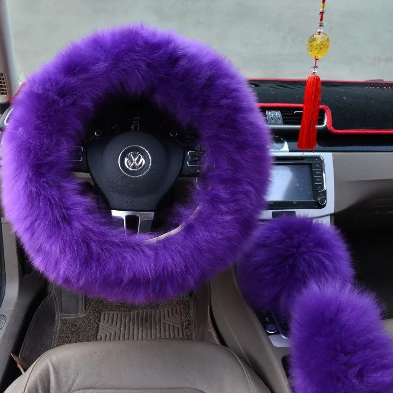 Three-piece wool and cashmere steering wheel cover in black on a car steering wheel