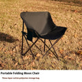 Beige portable folding chair with steel frame and Oxford cloth seat, unfolded for outdoor use.