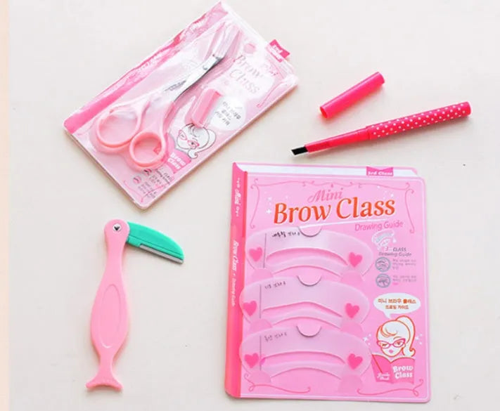 Eyebrow shaping set with pencil, scissors, razor, and stencil in black finish on white background