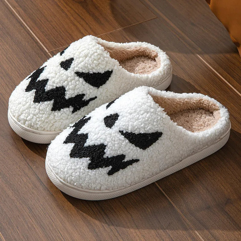 Halloween couple slippers with embroidered ghost face design in suede upper and PVC sole