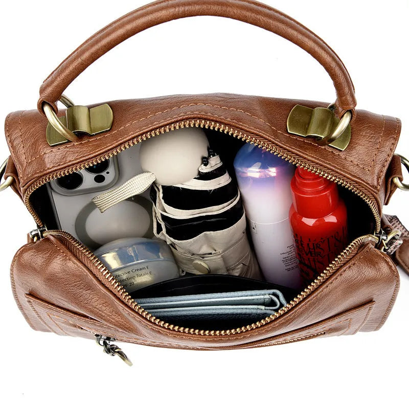 Women's retro style crossbody bag in six colour options with sandwich pocket design