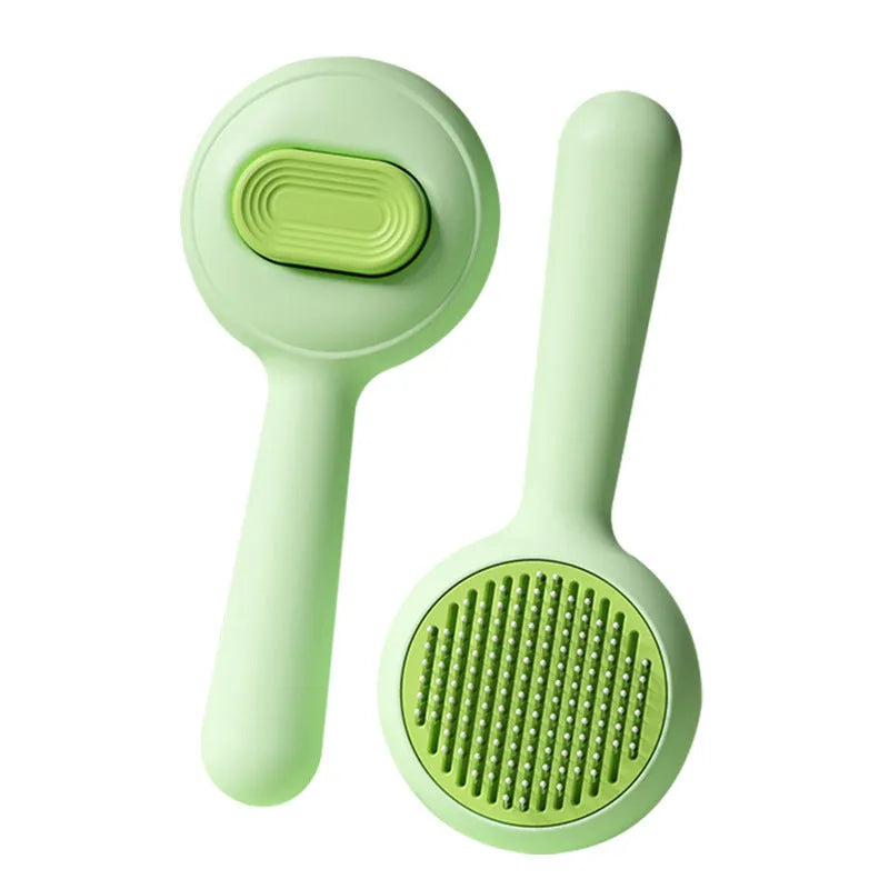 Green and yellow cat grooming brushes with stainless steel teeth and non-slip handles for pet hair removal