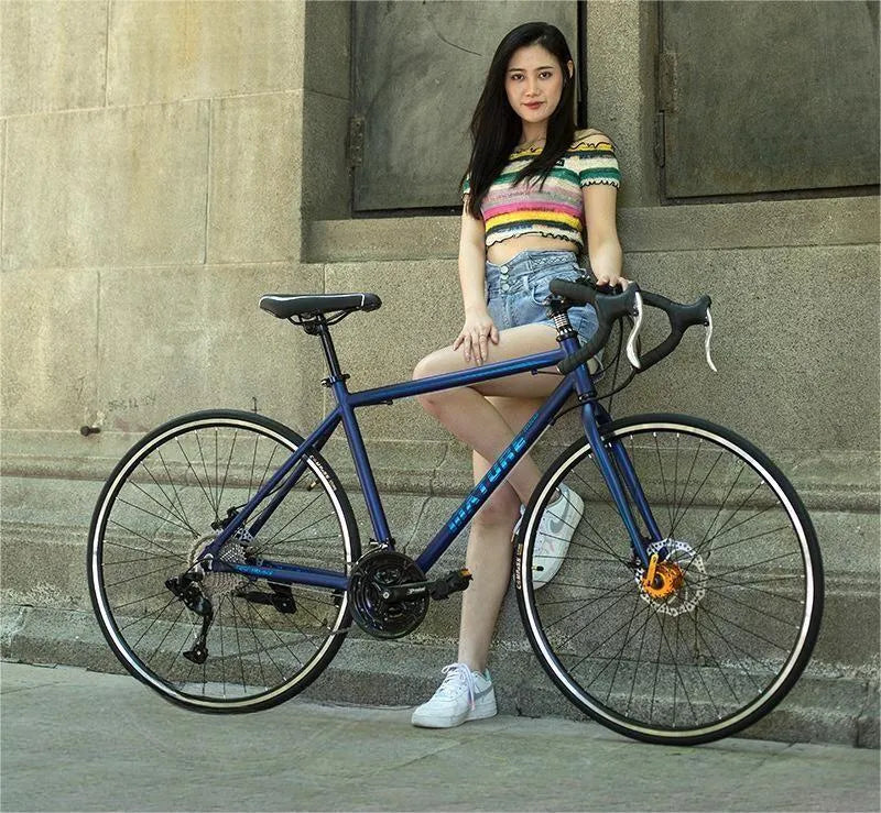 Aluminium alloy road bike with flat handlebar in matte blue finish 48cm frame size