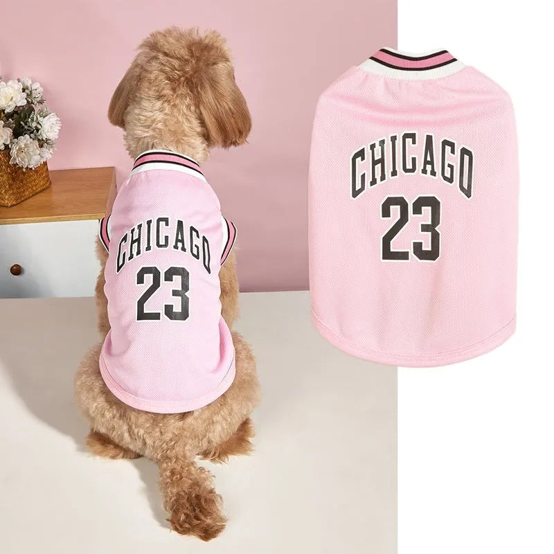 Mesh polyester dog basketball vest in black with basketball design, side view on a white background
