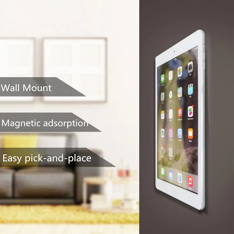 White magnetic tablet holder with adhesive base mounted on wall holding iPad
