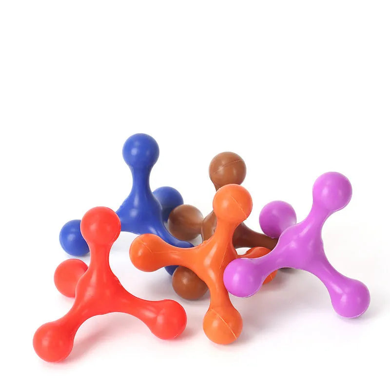 Three-legged silicone chew toy for dogs in blue, green, purple, red colours
