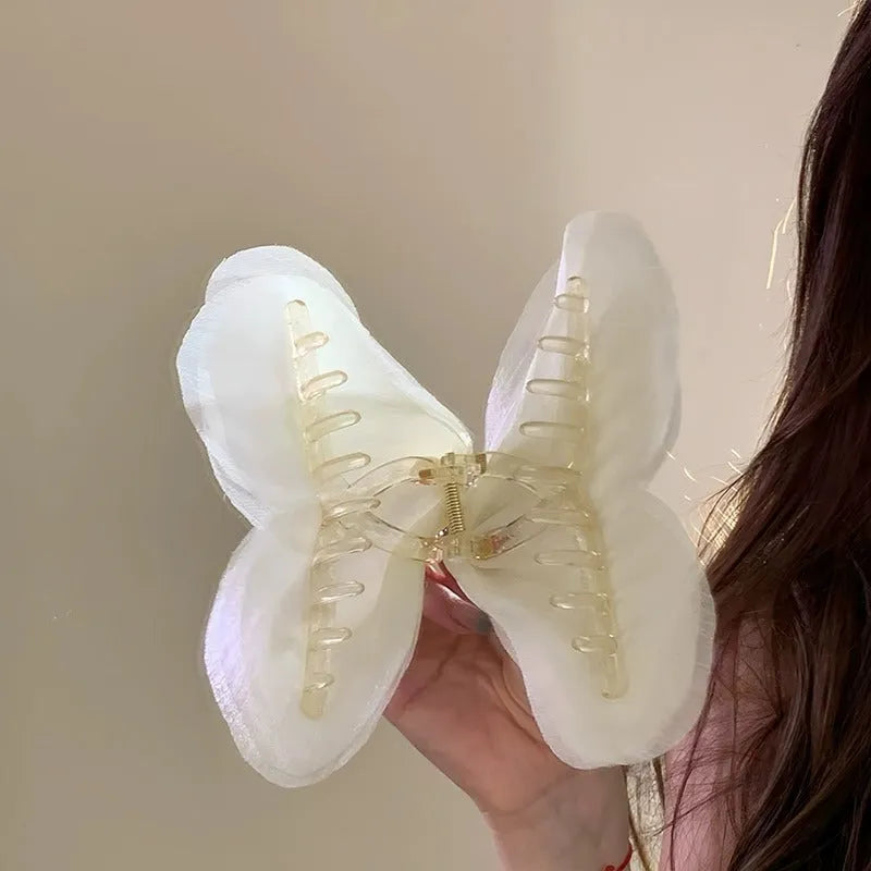 Tulle butterfly hair clip in French retro mesh design, available in five solid colours for women.