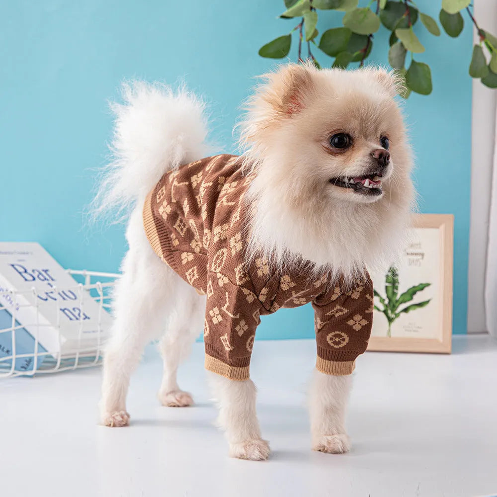 A thick wool dog sweater shown in a choice of monochrome or two-tone colours, sized from XS to XXL.
