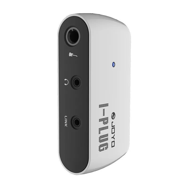 White metal portable headphone amplifier with multi-effects distortion, shown with batteries and connector.