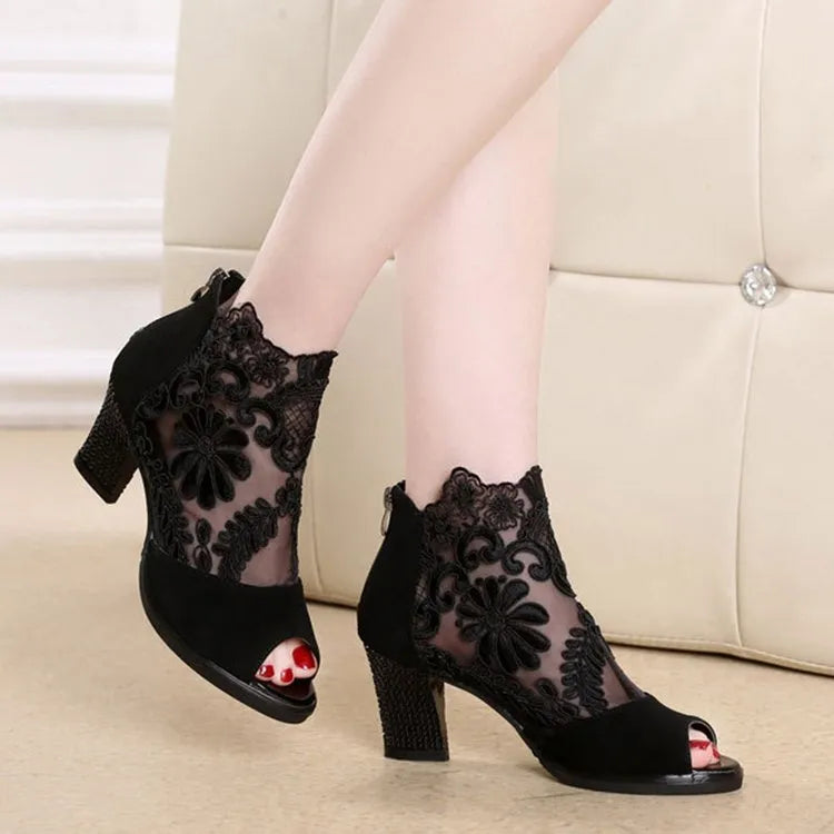 Lucyever women's black gladiator sandals with flower lace, peep toe, square heel, and side zip.