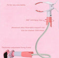 Blue extended baby feeding bracket at 1.05 metres height holding a bottle.