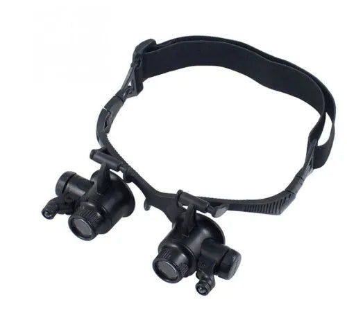 Black double eye magnifier glasses with LED lights and interchangeable lenses for precision repair work