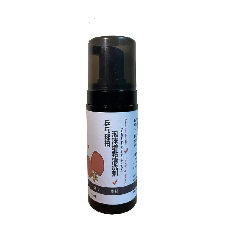 Table tennis racket cleaner kit with sponge mop and 100ml rubber cleaning agent on a court
