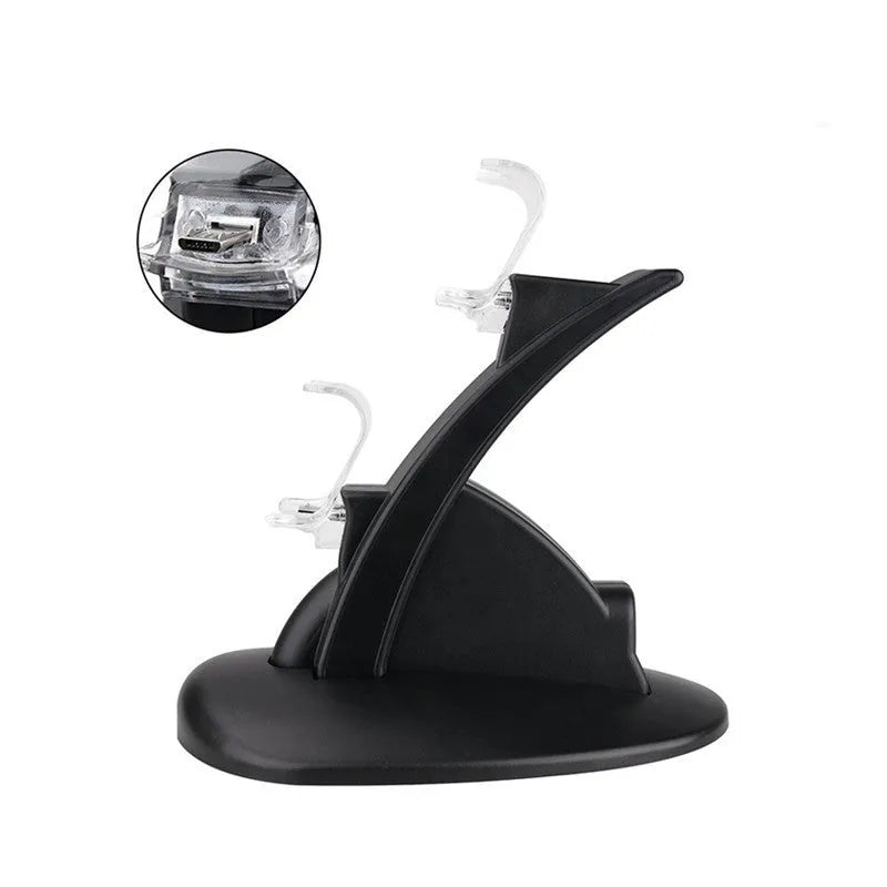 Black dual charging stand holding two Xbox One controllers upright.