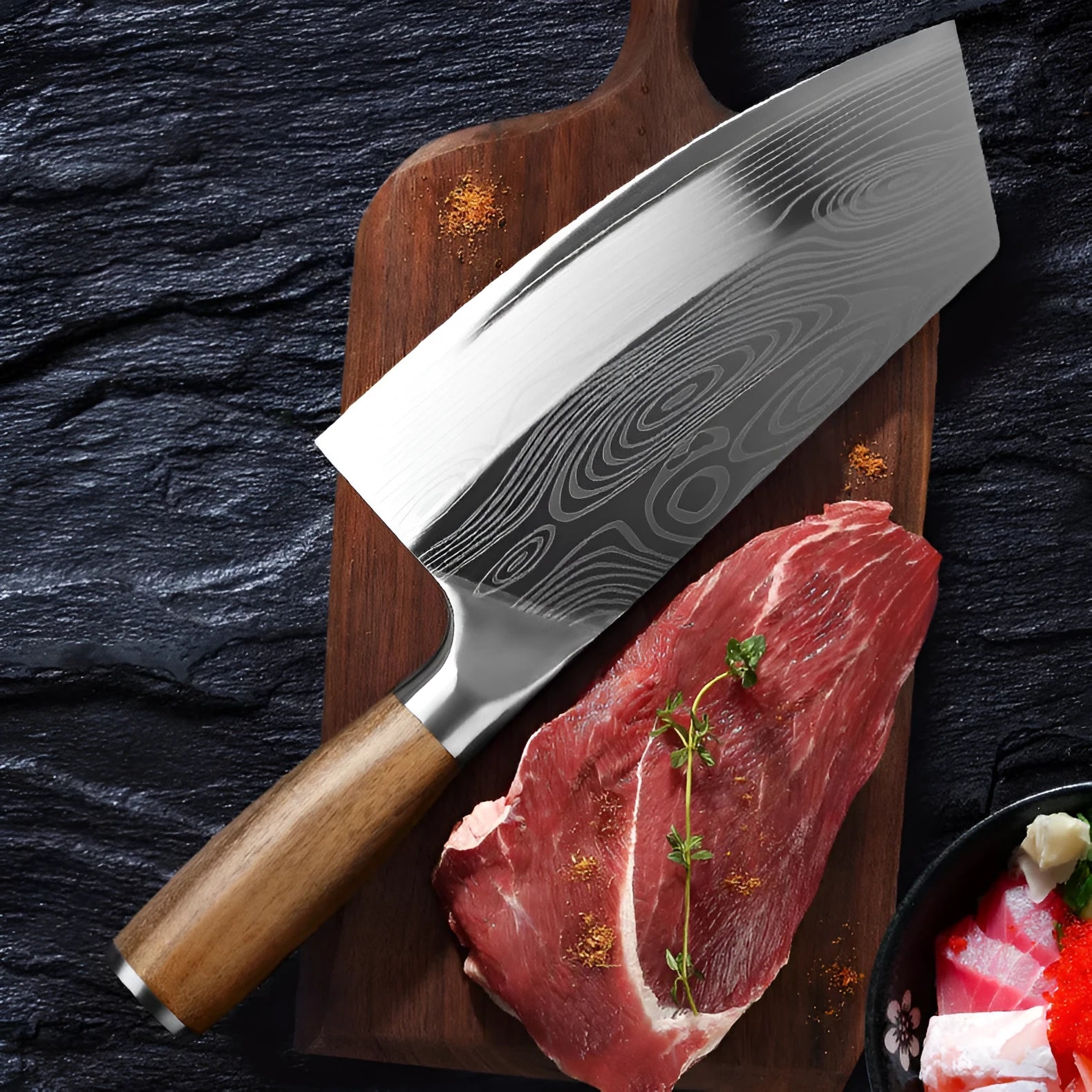 Forged stainless steel kitchen knife with a 320mm blade on a wooden cutting board.