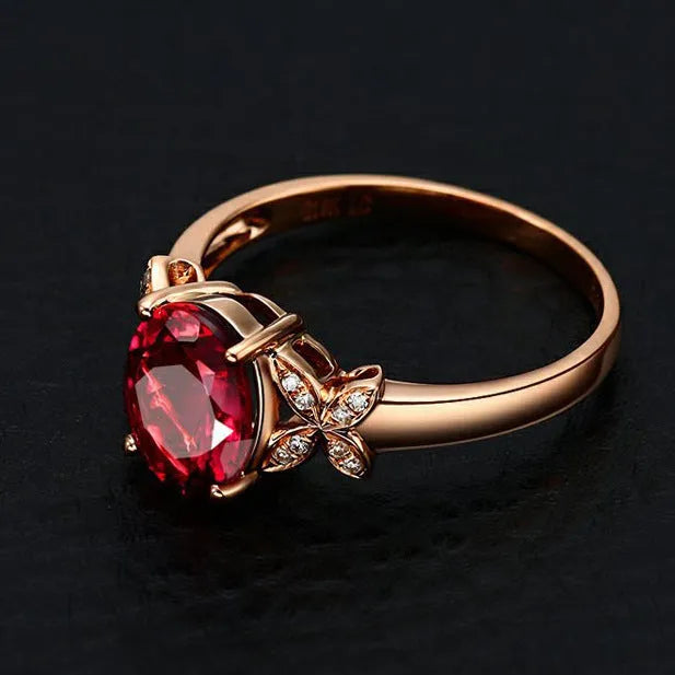 Women's heart-shaped butterfly ring in 18k rose gold plating with red or blue enamel option.