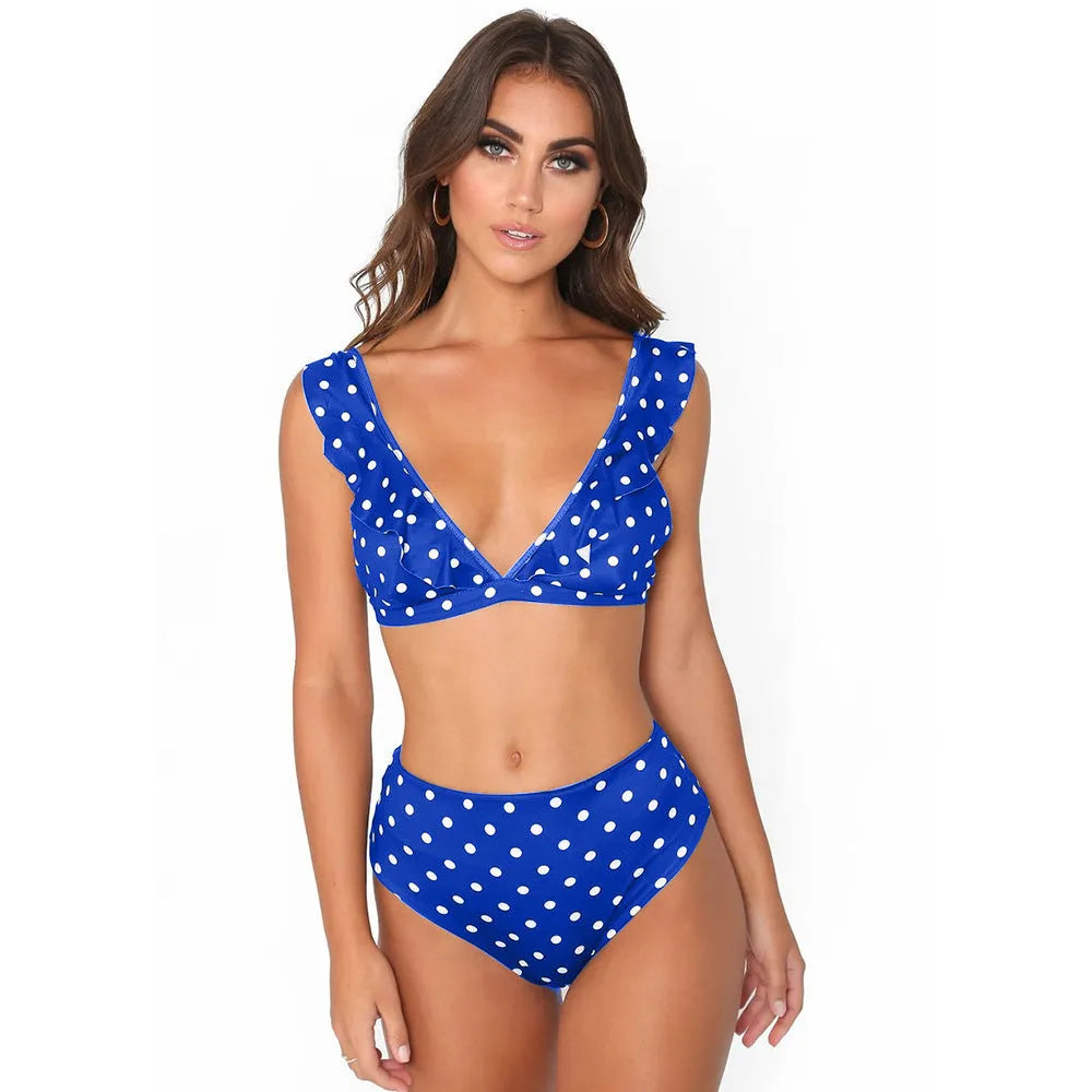 Black and white polka dot women's bikini set with a deep V-neck top and ruffled trim.
