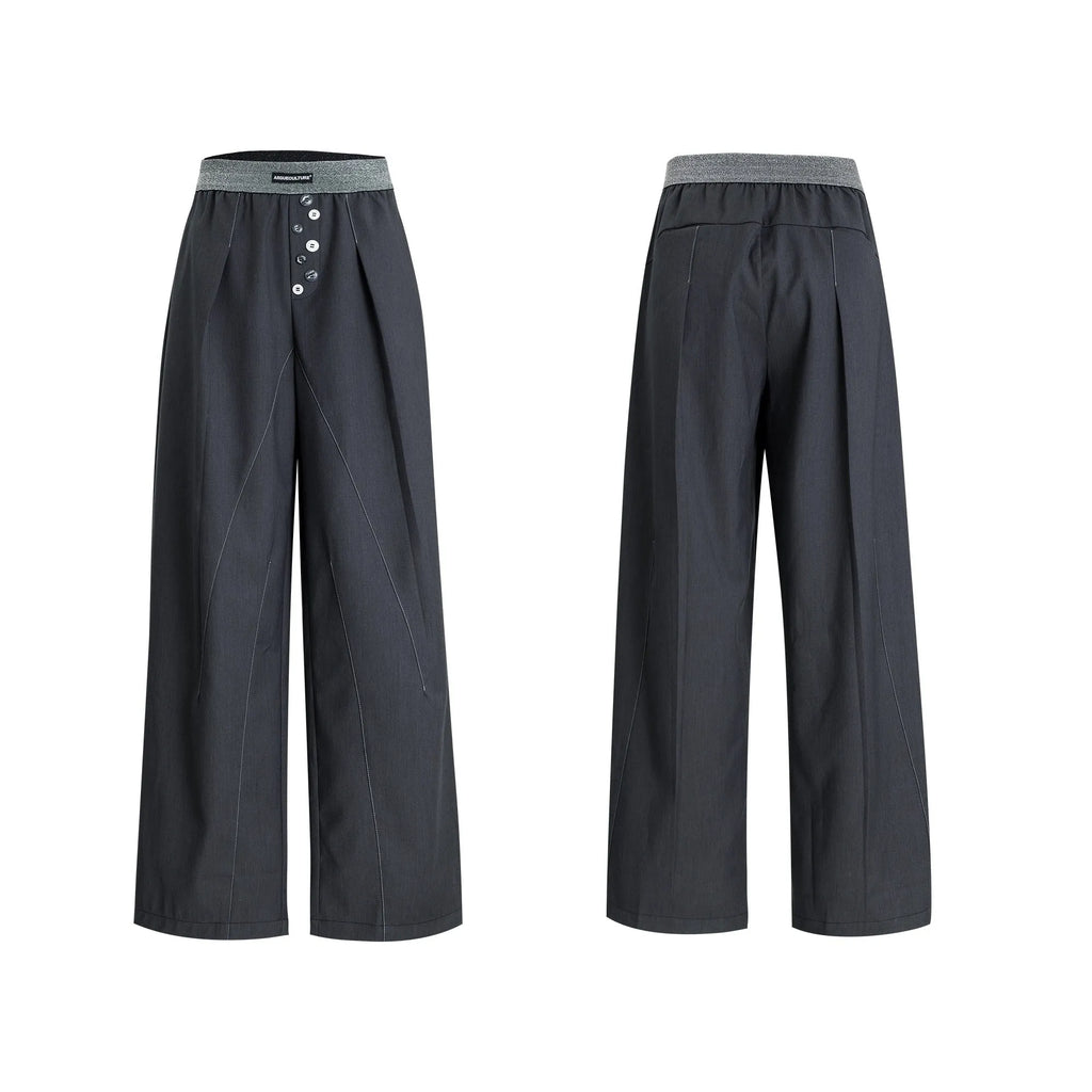 A pair of high-waisted straight-leg casual trousers in grey, showing the button-fly detail.