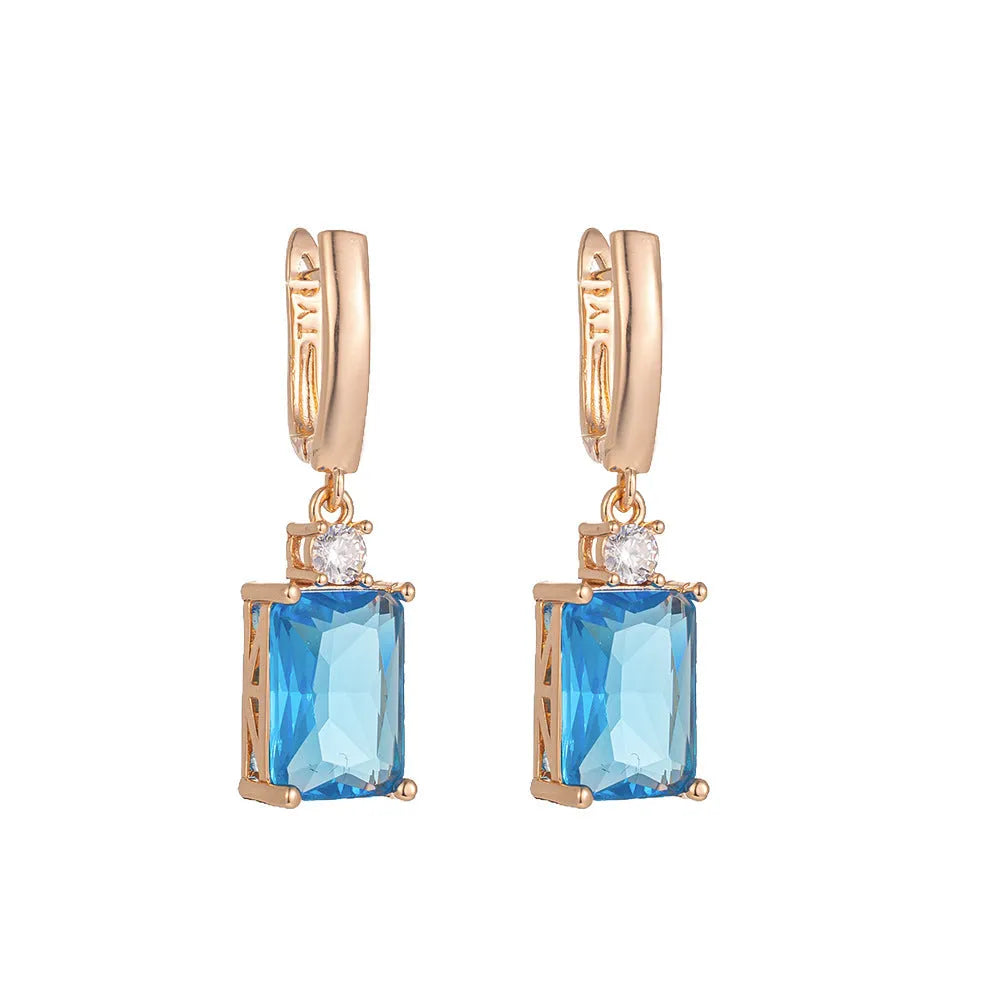 Square geometric copper earrings with electroplated gold or silver finish and quadrilateral design