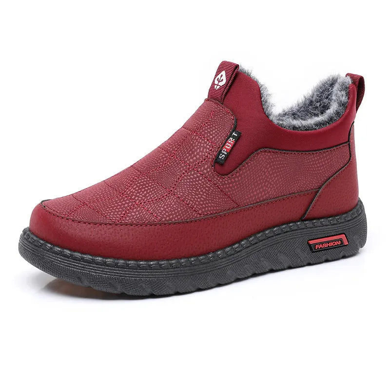 Women's black casual flat ankle boots with a synthetic leather upper and rubber sole.
