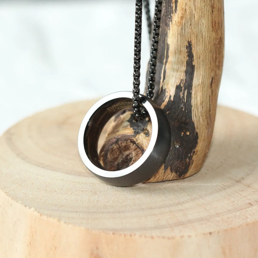 Men's silver stainless steel pearl chain necklace with titanium steel circle pendant on grey background