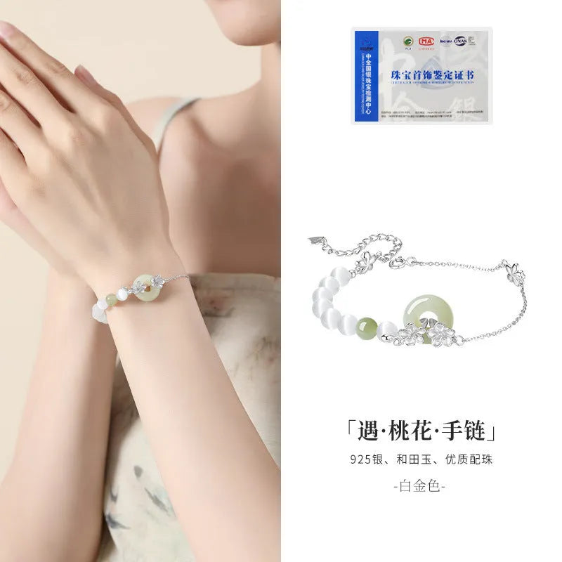 Pure silver peach blossom bracelet for women with a safety buckle clasp in gold or white gold colour.