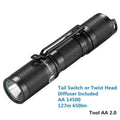 Black Lumintop Tool AA 2.0 compact keychain flashlight with magnetic tail cap on a keyring.