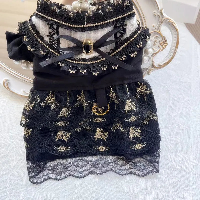 Golden gothic-style skirt costume on a small dog, showing the full princess silhouette and detailed sizing.