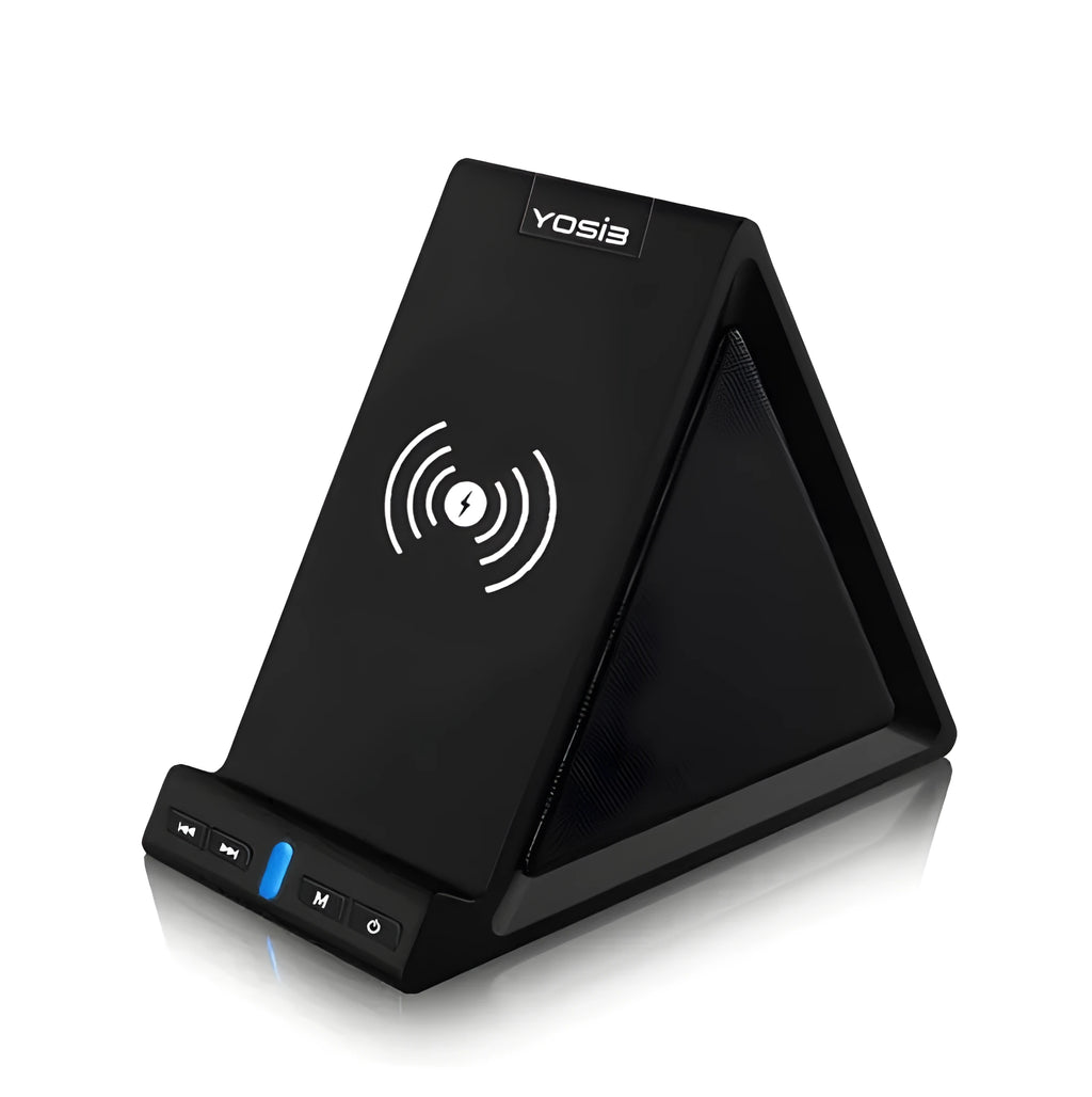 Black multifunctional Bluetooth speaker with integrated mobile phone stand and wireless charging pad on a desk