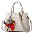 Women's cross section square PU messenger bag with embroidery in royal blue colour showing soft handle and single shoulder strap