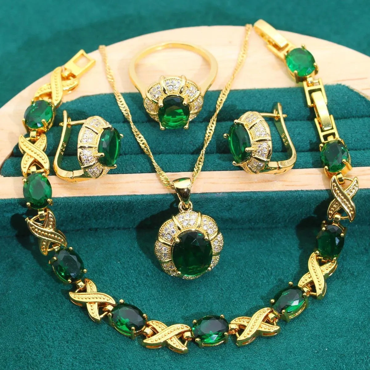 18k gold plated jewellery set with multi-colour cubic zirconia stones, showing necklace, earrings, ring, and bracelet.