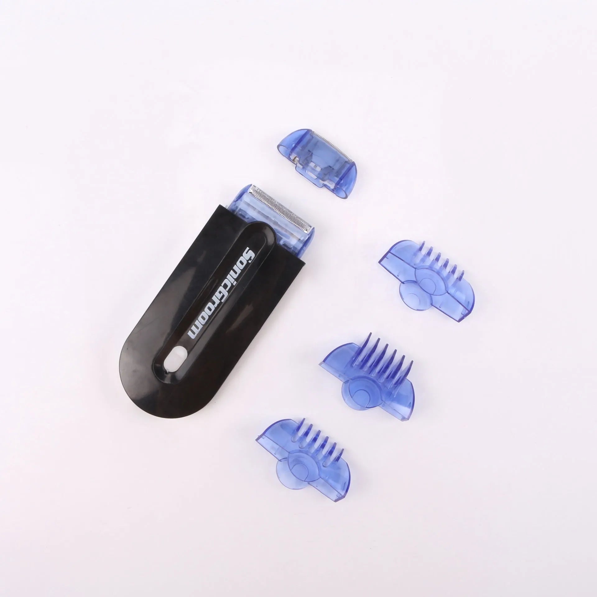 Finishing Touch rechargeable electric hair remover device with trimmer and foil heads on a white background