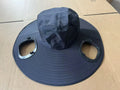Man's grey solar fan cap with large brim and a small solar panel and fan visible on the front.