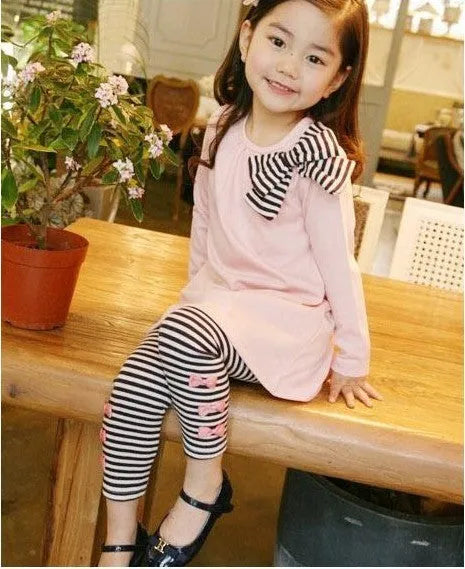 Cotton pink girl clothing set, sizes 110cm to 140cm, on a child