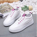 Women's breathable canvas sneaker in microfiber leather with rubber outsole, shown in black, green, or pink