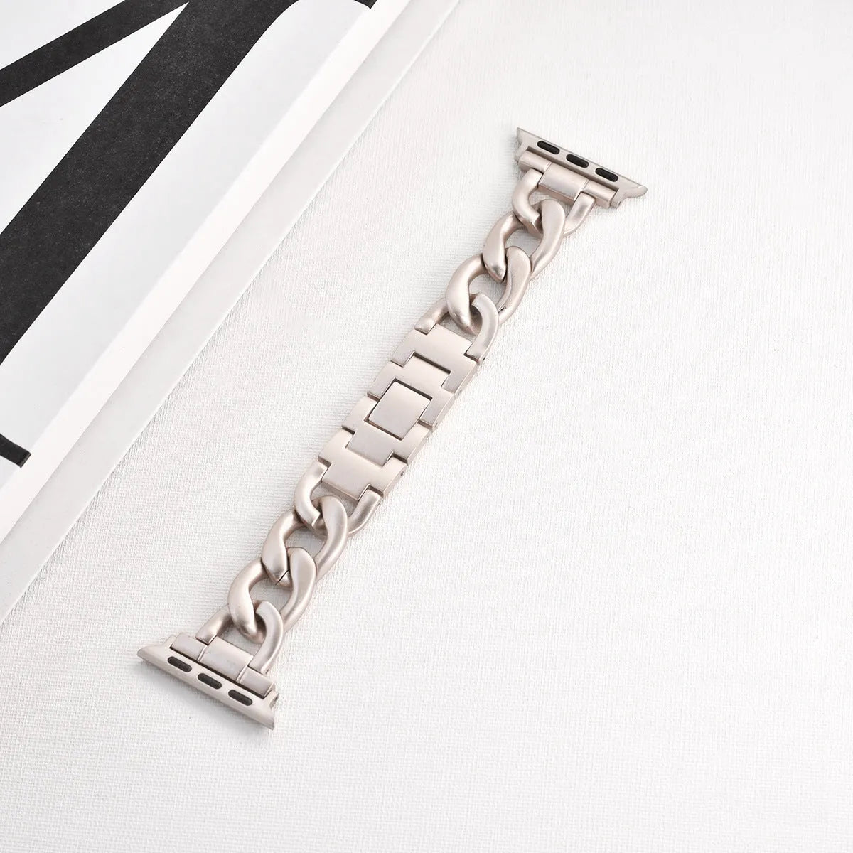 Metal denim chain link Apple Watch strap in silver, black, gold, rose gold and starlight colours.