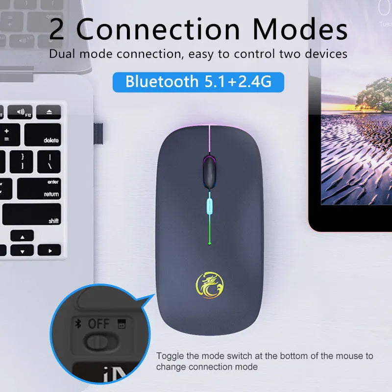 Black and white silent wireless Bluetooth mouse with luminous charging scroll wheel on a desk.