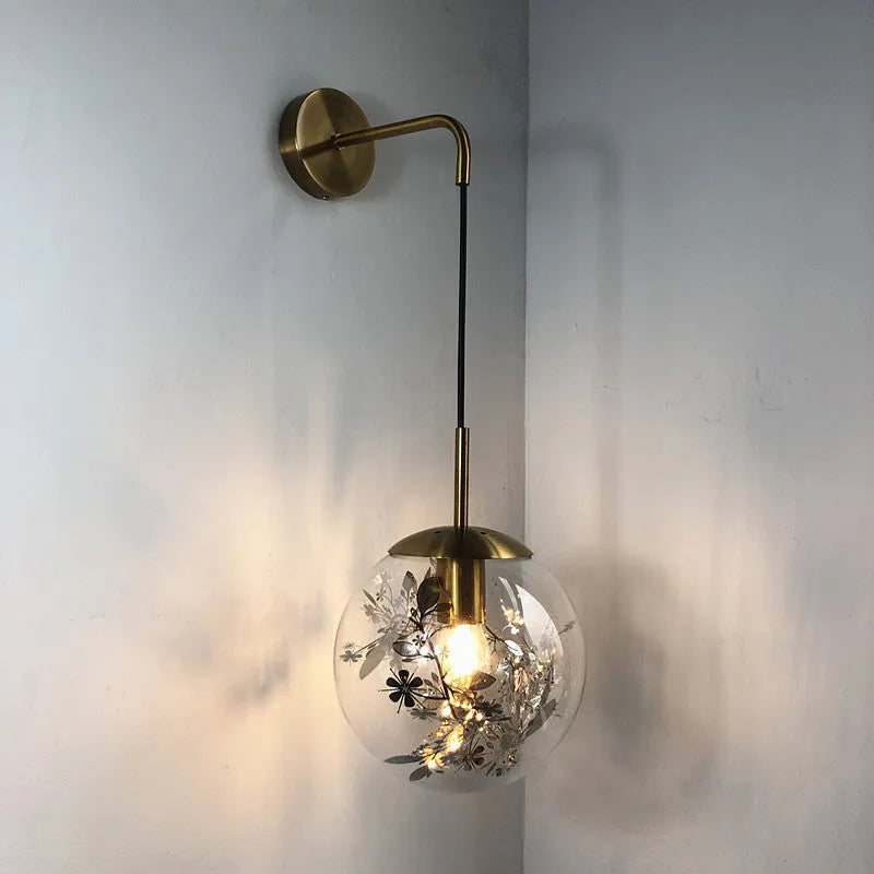 Modern glass wall lamp with LED light in gold or silver finish, shown in 15cm and 20cm sizes.