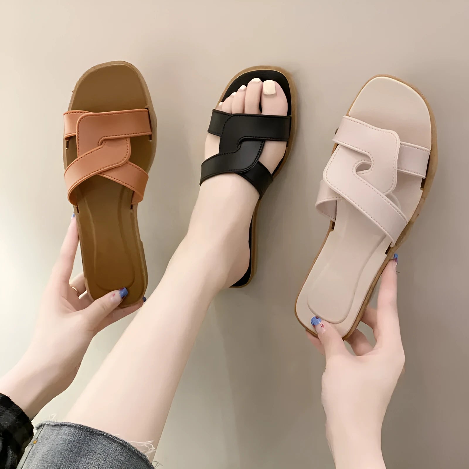 Women's PVC cross-strap sandals with toe ring and non-slip sole in light blue colour.