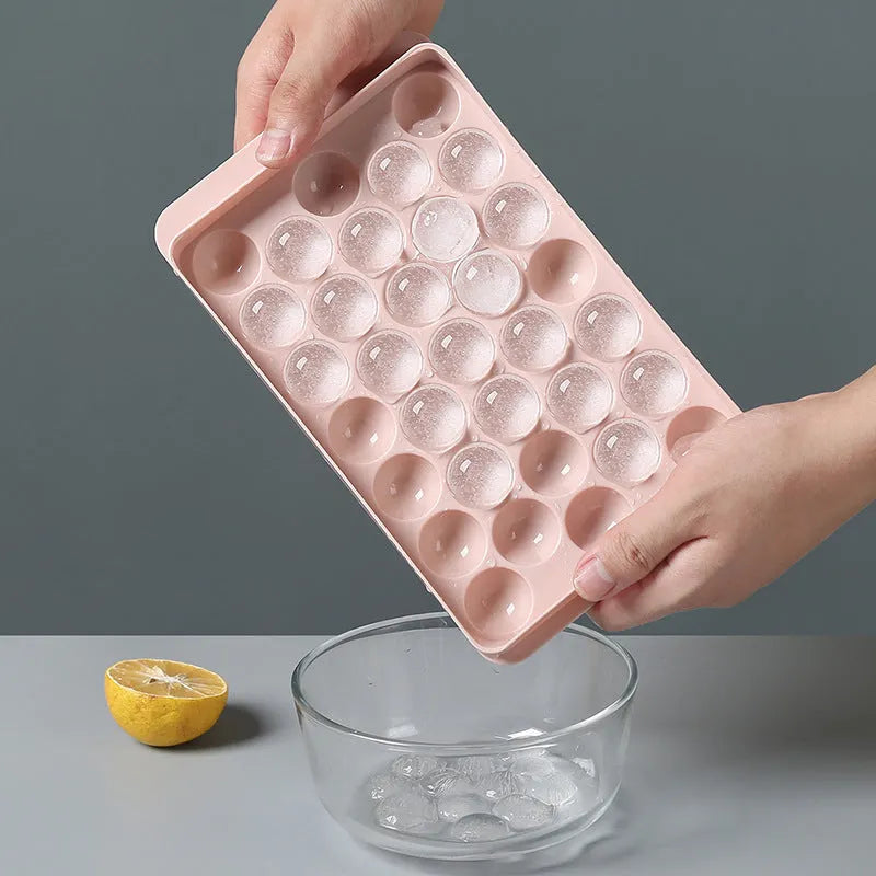Sky blue 3D round ice mould tray with easy-release design showing spherical ice ball compartments